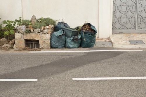 Modern waste clearance vehicles in action